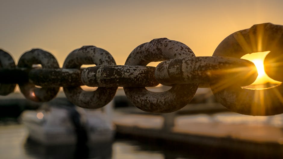 Illustration depicting a person breaking free from toxic chains, symbolizing the end of a toxic relationship and personal growth.